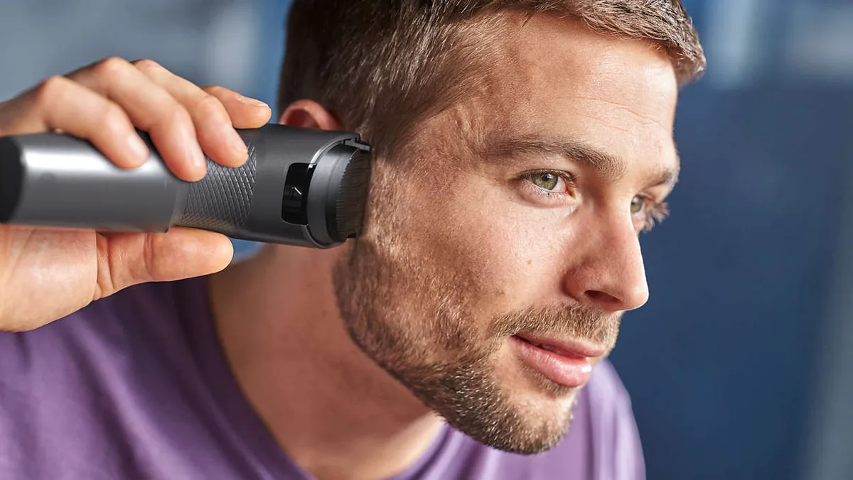 Машинка для стрижки волосся Philips Series 3000, з роторним мотором, 2 насадки, сталева лезо, чорного кольору.