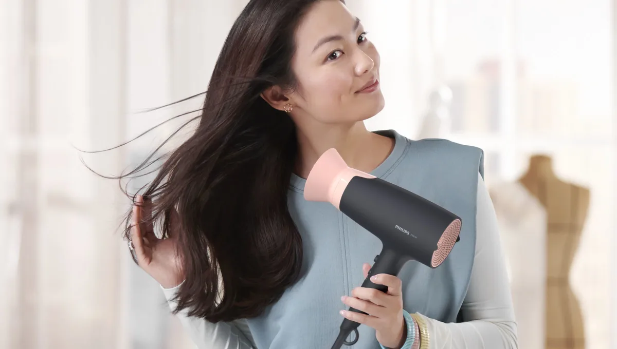 Фен Philips 3000 Series, 2100 Вт, 3 скорости, ионизация, холодный обдув, черный с розовыми акцентами