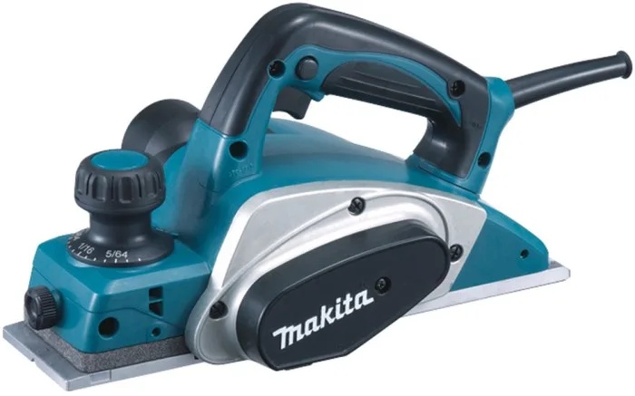 Рубанок Makita KP0800, 620 Вт, ширина стругання 82 мм, глибина обробки до 2.5 мм, вага 2.6 кг.