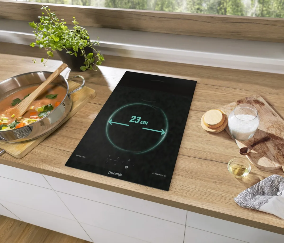 Індукційна варильна панель Gorenje, 30 см, Доміно, з функцією PowerBoost та сенсорним керуванням, чорна, з комбінованими конфоркам
