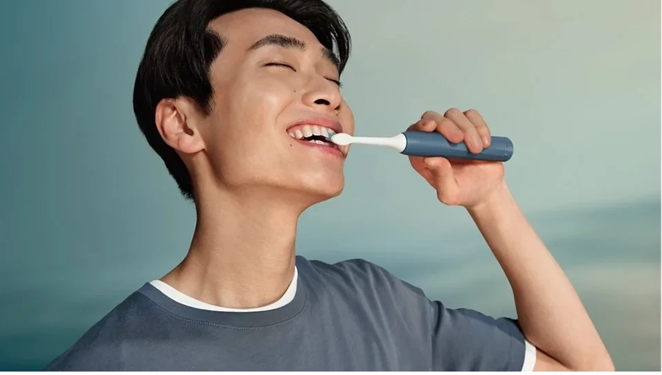 Електрична зубна щітка Philips Sonicare 2100, комплект з 2 насадок, колір морської хвилі.