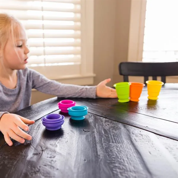 Тактильная игрушка Fat Brain Toys Силиконовые чашки 6 штук Разноцветные