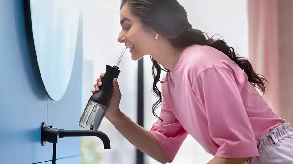 Іригатор Philips бездротовий пульсуючий 250 мл чорний 2 насадки