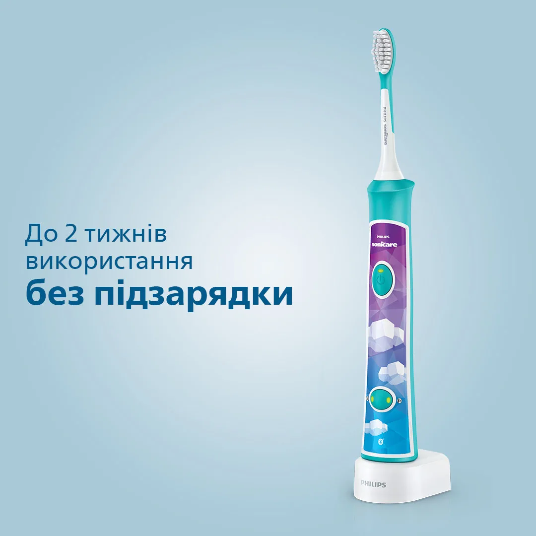 Зубна електрощітка Philips для дітей акумуляторна 2 насадки пульсуюча біла