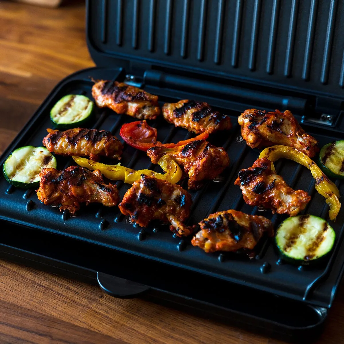 Гриль George Foreman прижимний Fit Grill середній 1630Вт, 1 температурний режим, пластиковий корпус, чорний.
