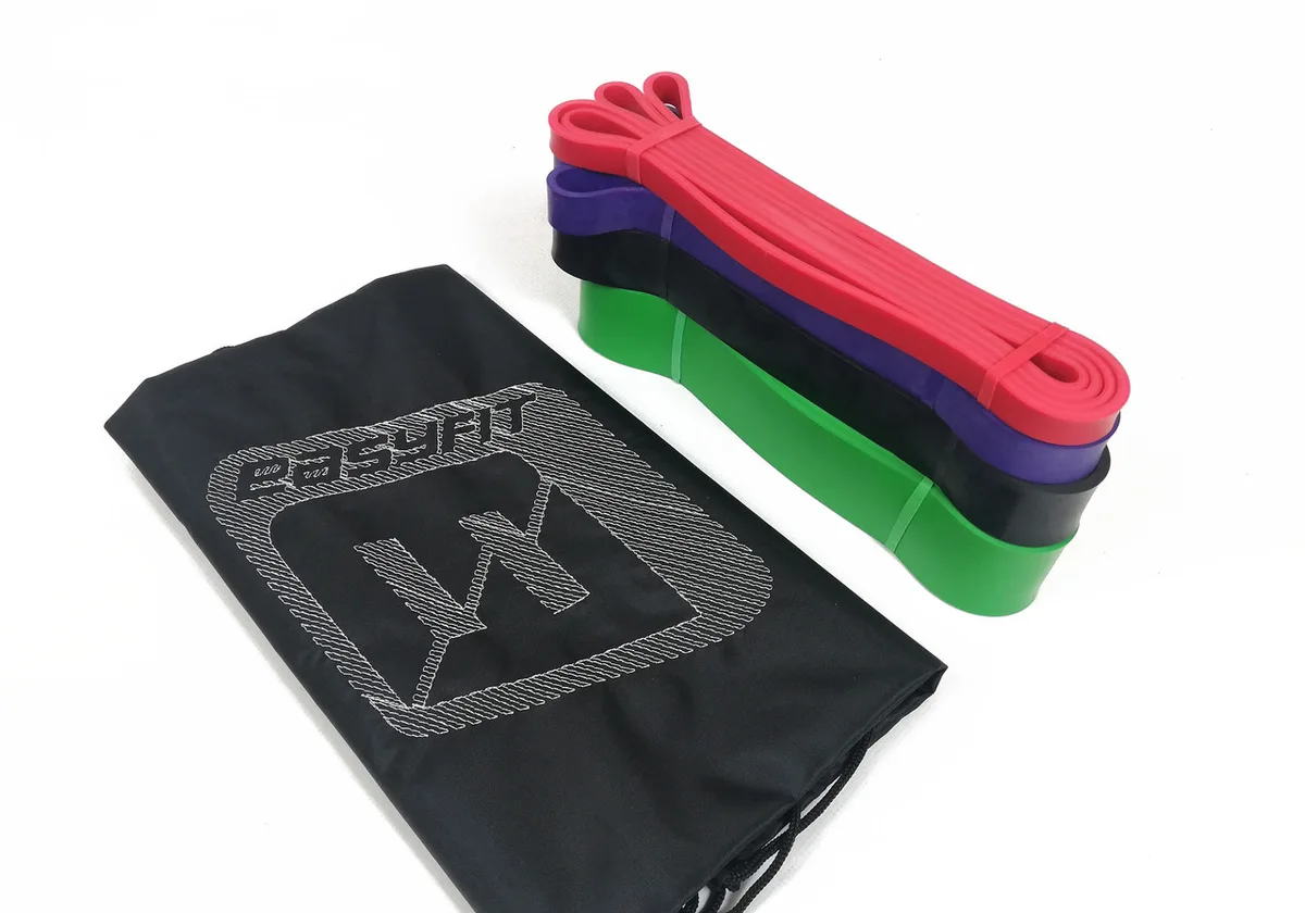 Резинка EasyFit латекс 2-65 кг червона, фіолетова, чорна, зелена 4 шт.