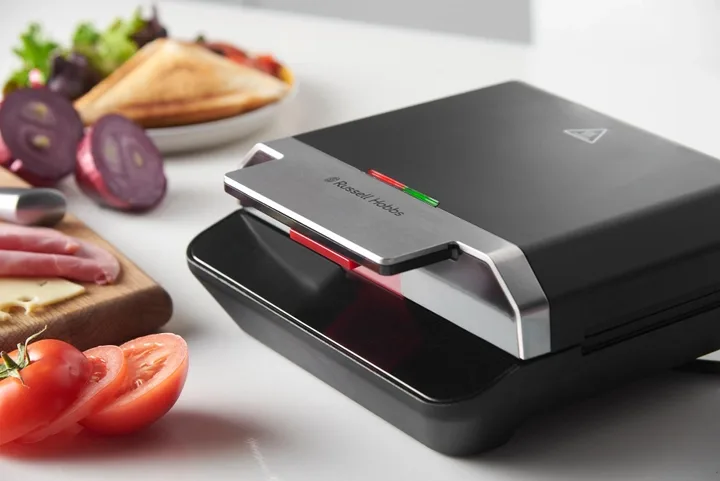 Прилад для приготування сендвічів Russell Hobbs, 750Вт, 1 пластина для сендвічів, пластиковий корпус, чорний.