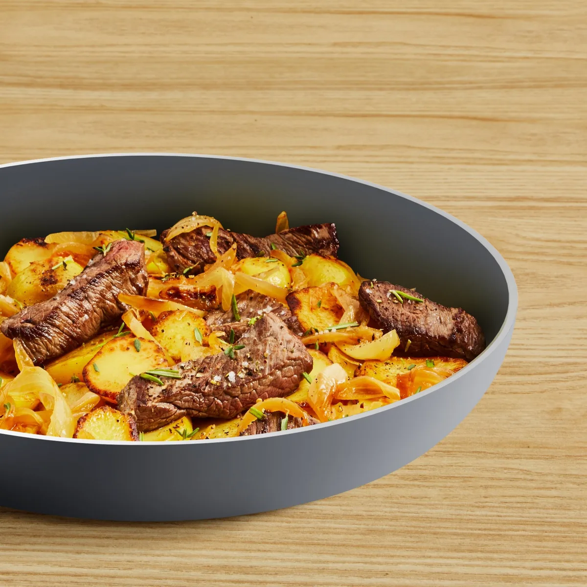 Сковорода Tefal Halo, діаметр 28 см, алюмінієва, з бакелітовою ручкою, сірого кольору.