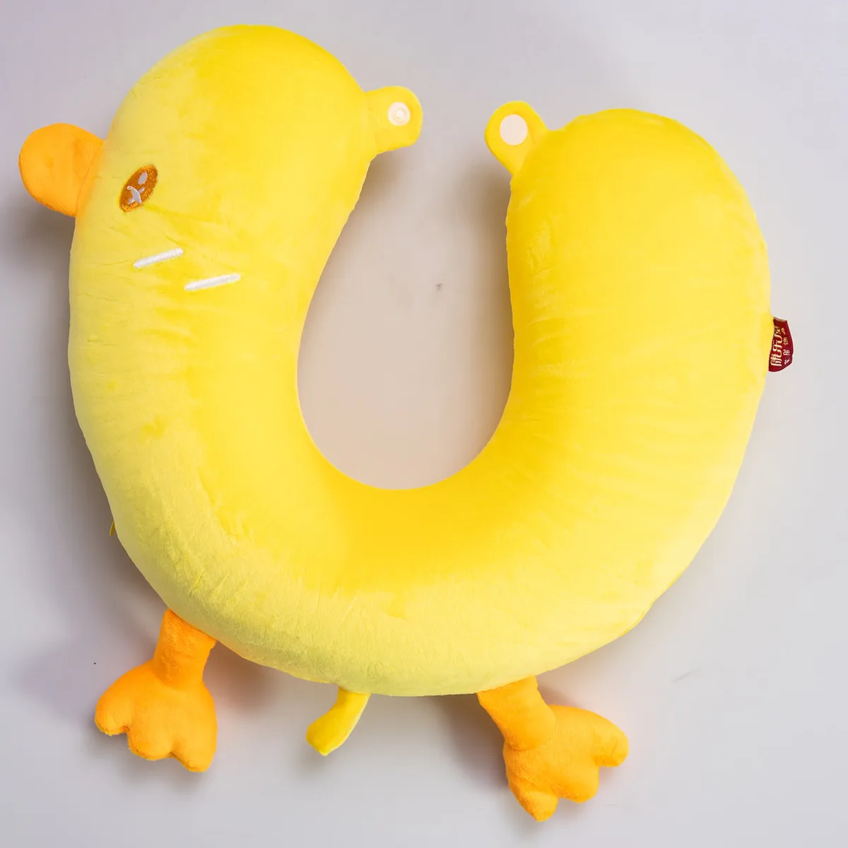 Подушка для шиї Duck плюшевий 30х30х10 см жовта