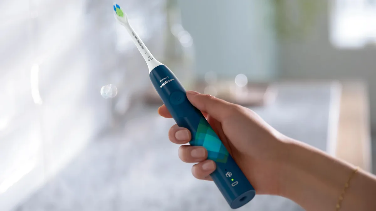 Електрична зубна щітка Philips Sonicare 4100 Series, 31 000 коливань на хвилину, 1 насадка, синя.