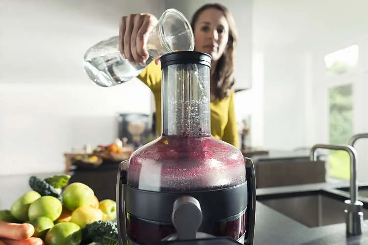 Соковитискач Philips Avance Collection 1000Вт, чаша 1л, жмих 2.1л, жолоб для цілих яблук.