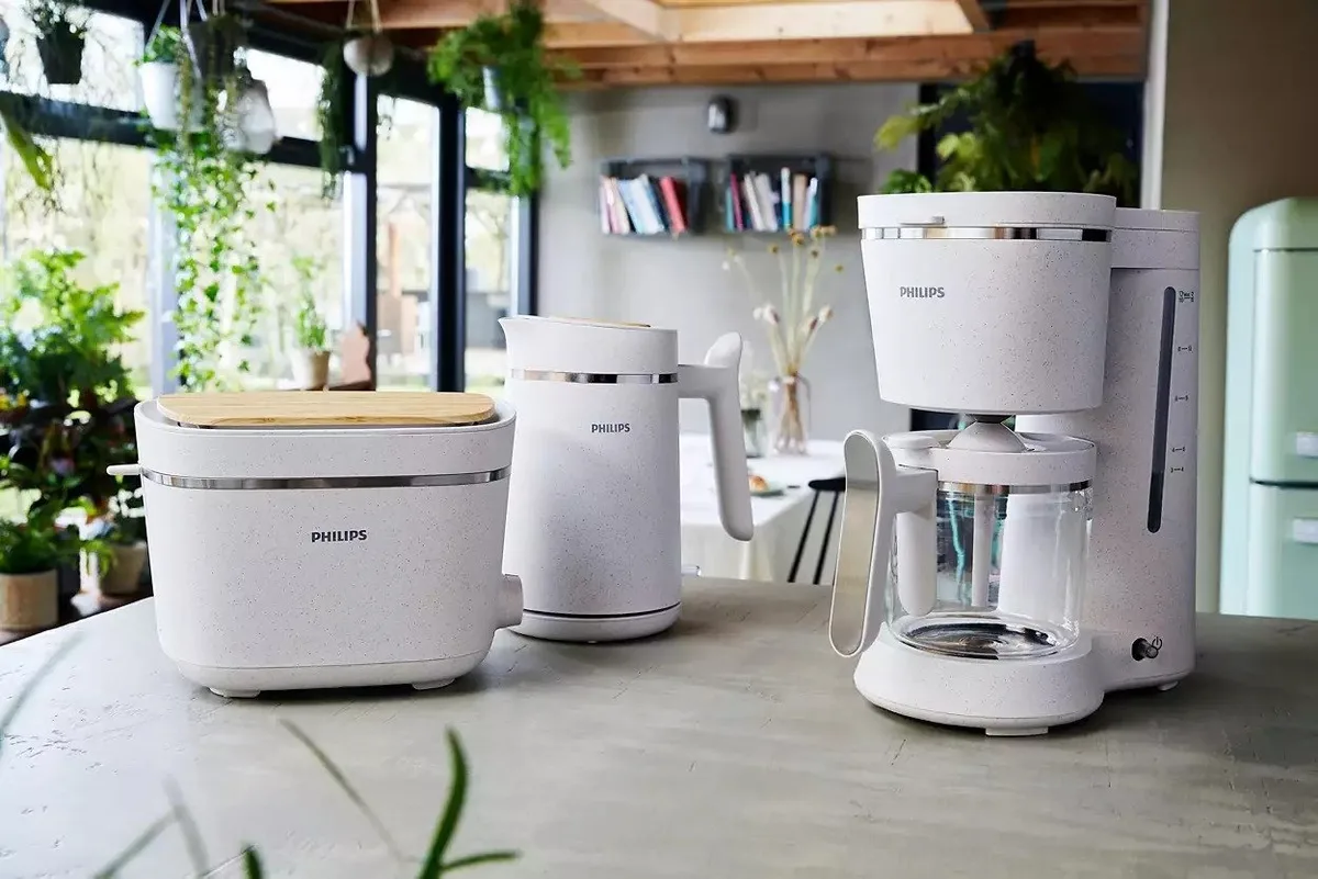 Тостер Philips Eco Conscious Edition 830 Вт, з кришкою для захисту від пилу, виготовлений з пластика, білий.