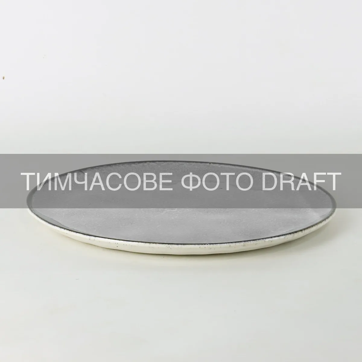 Тарілка Ardesto порцелянова 22 см сірого кольору