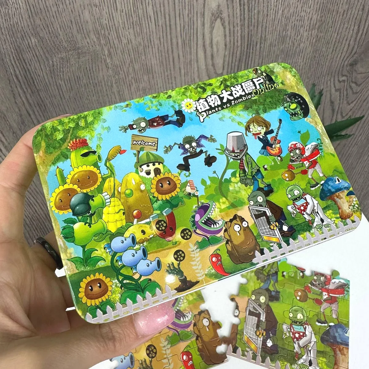 Дитячі пазли 100 деталей металеві коробочка 29х23 см різні кольори Plants vs Zombies