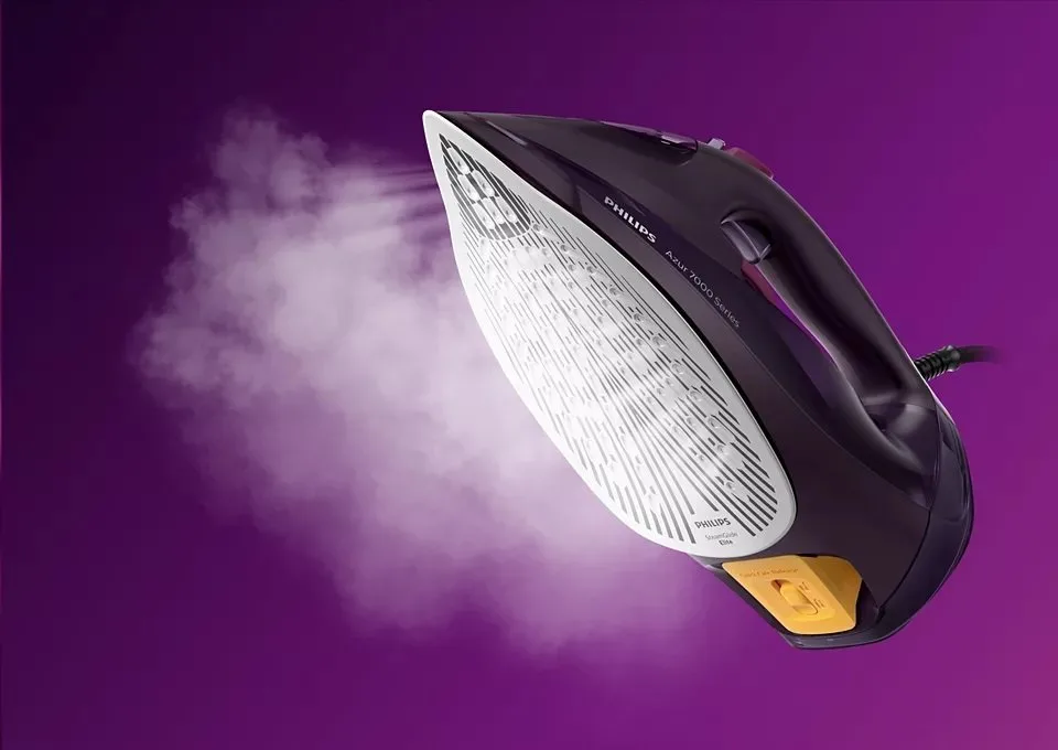 Парова праска Philips 7000 Series, 3000Вт, 300мл, потужний паровий удар - 250гр, постійний пар - 50гр, нержавіюча сталь, фіолетови