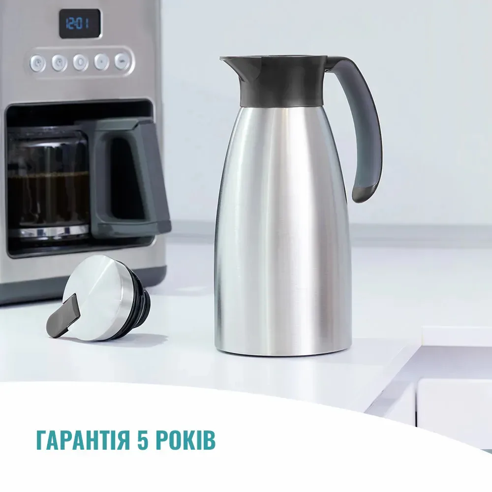 Термос для напоїв Tefal Soft Grip, об'ємом 1.5 л, з нержавіючої сталі та пластику, чорного кольору.