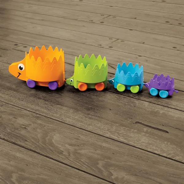Игрушка каталка Fat Brain Toys разноцветные ежики 17х18х17 см пластиковая