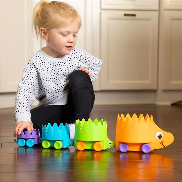 Игрушка каталка Fat Brain Toys разноцветные ежики 17х18х17 см пластиковая