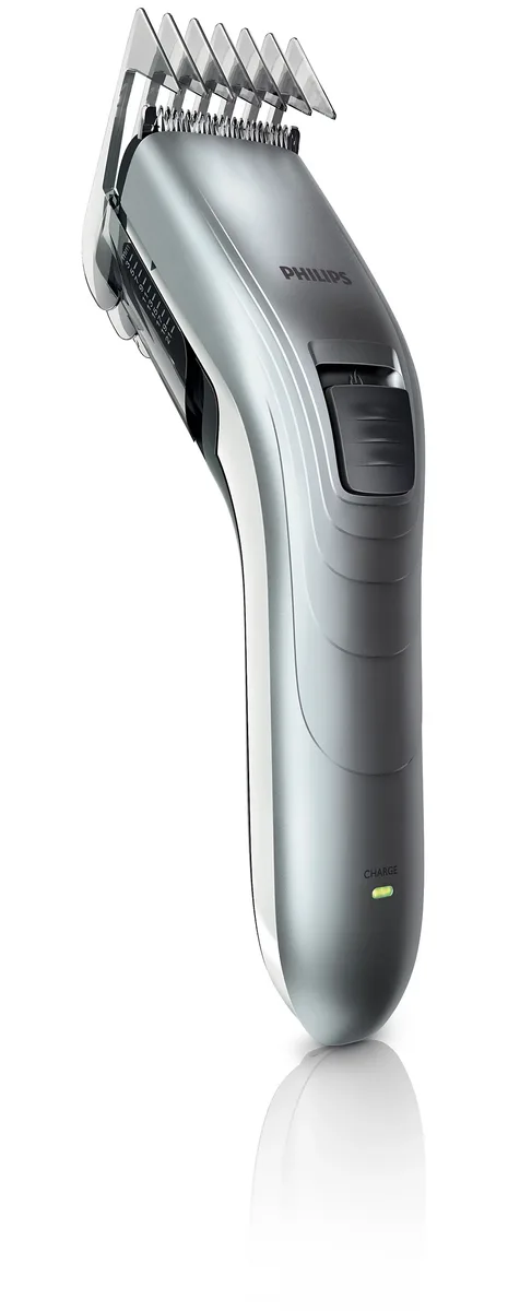 Акумуляторна машинка для стрижки Philips з роторним мотором, виготовлена зі сталі, сріблястого кольору.