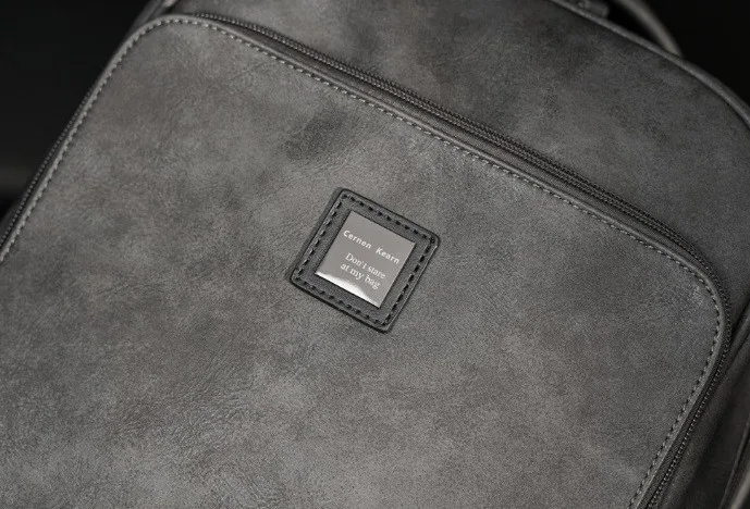 Мужской рюкзак экокожа 29х13х42 см серый