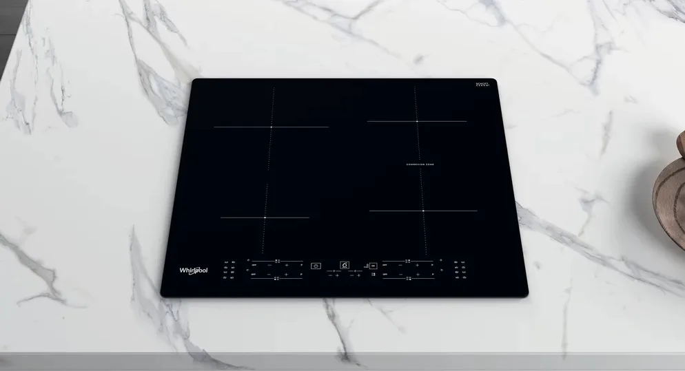 Індукційна варильна поверхня Whirlpool, 60 см, з розширеною зоною, чорного кольору.