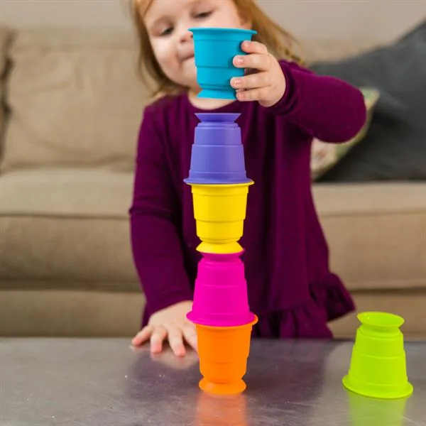 Тактильная игрушка Fat Brain Toys силиконовые чашки 6 шт разноцветные
