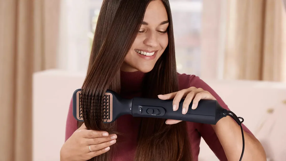 Фен-щітка Philips 5000 Series, 1000 Вт, 3 режими, іонізація, 5 насадок, синій колір.