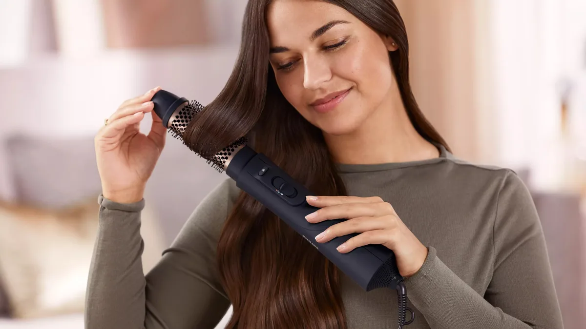 Фен-щітка Philips 5000 Series, 1000 Вт, 3 режими, іонізація, 5 насадок, синій колір.
