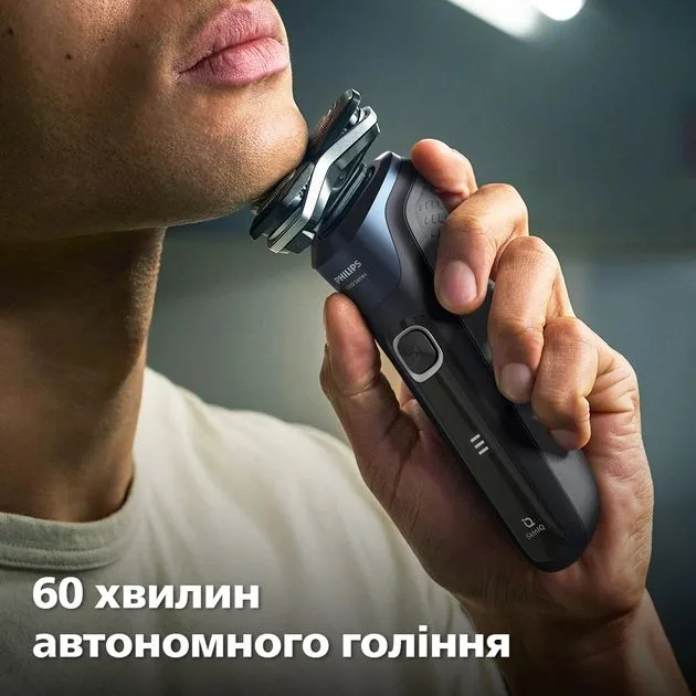 Електрична бритва Philips роторного типу Series 5000, потужність 9 Вт, з трьома бритвяними головками, Li-Ion акумулятор, для сухог