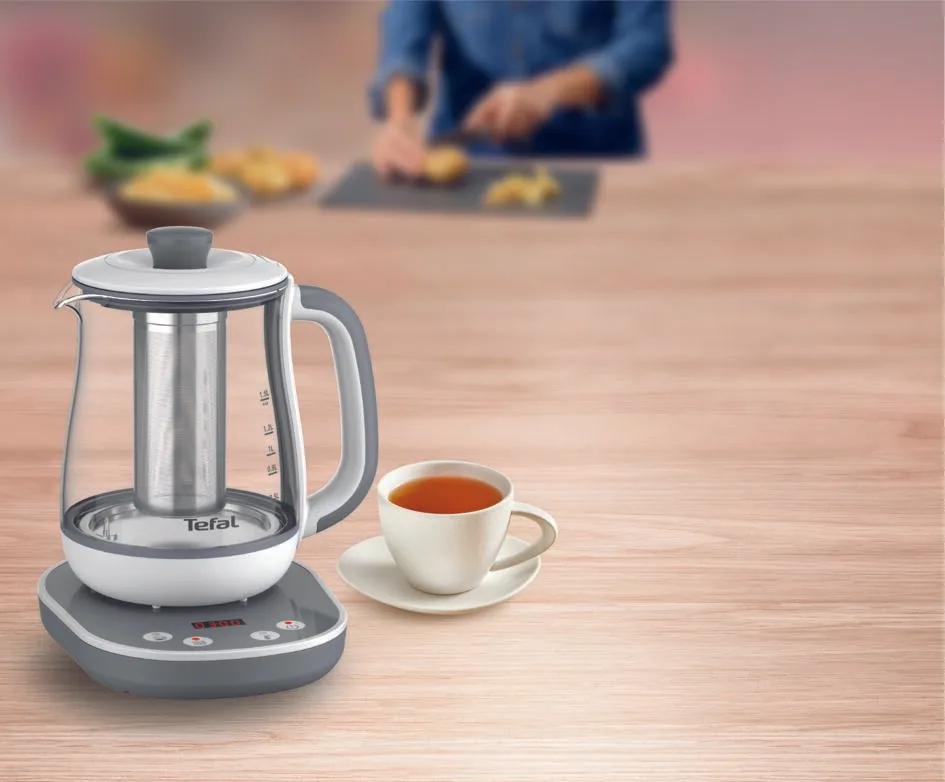 Электрический чайник Tefal Tastea для заваривания чая 15 л, стеклянный, с функцией заваривания, бело-серого цвета.