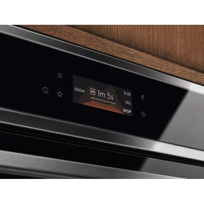 Вбудована мікрохвильова піч Electrolux, 44 л, електронне управління, 2100 Вт, гриль, чорний дисплей.