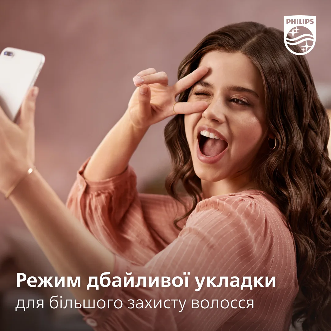 Фен-щітка Philips керамічна 38 мм рожевий 800 Вт з іонізацією