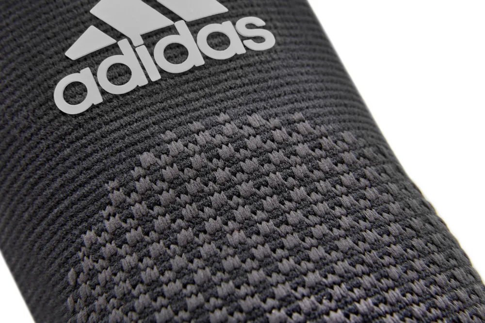 Фіксатор ліктя Adidas Нейлон 47% Поліестер 43% Еластан 10% S чорний