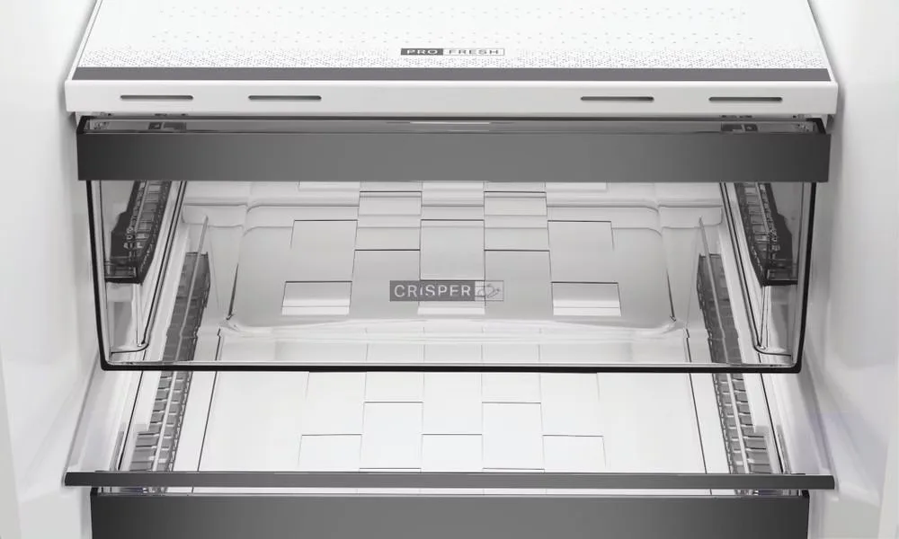 Холодильник Whirlpool з нижнім морозильником, габарити 186.5x60x66.3 см, об'єм холодильного відділу - 210 л, морозильного - 104 л,