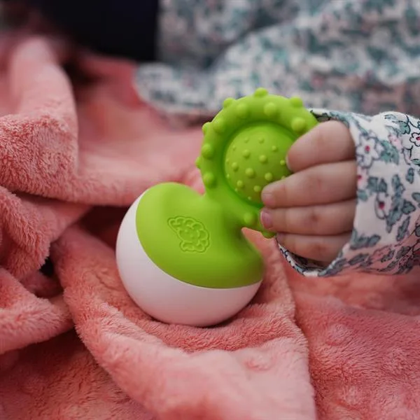 Прорізувач-неваляшка Fat Brain Toys харчовий силікон 6х6х12 см зелений