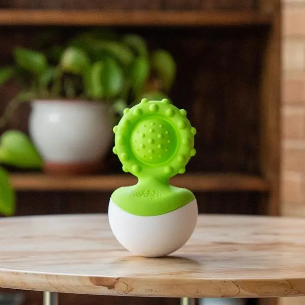 Прорізувач-неваляшка Fat Brain Toys харчовий силікон 6х6х12 см зелений