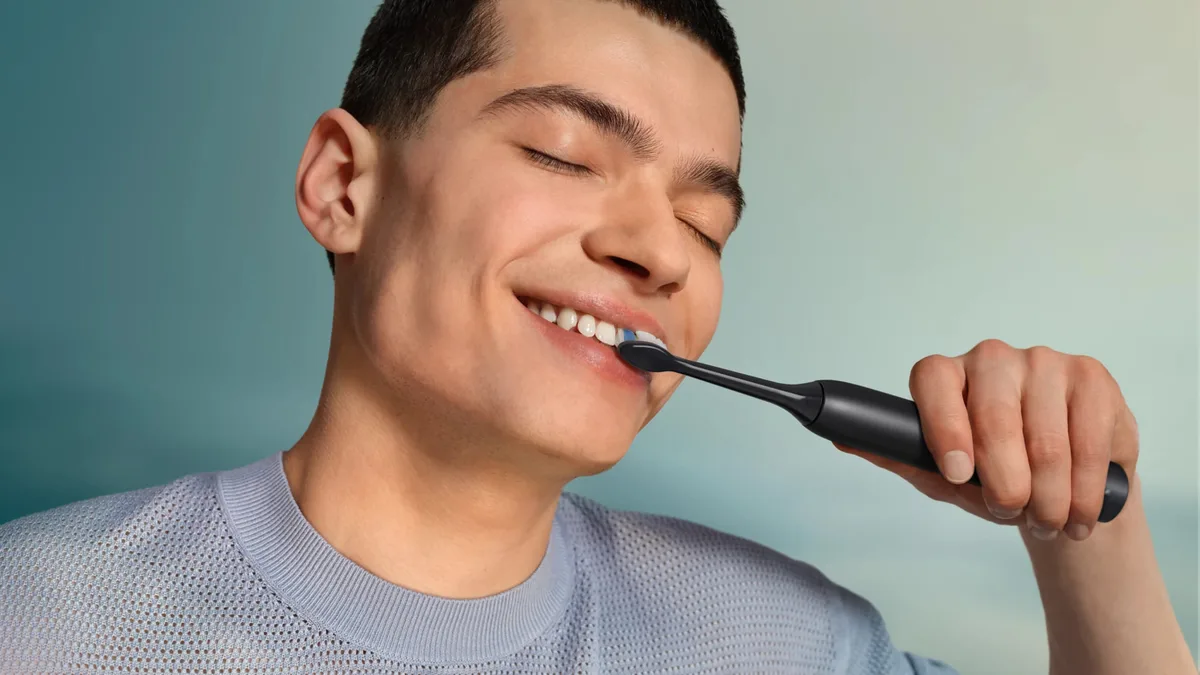 Електрична зубна щітка Philips Sonicare 3100 серії, комплект з 2 штук, чорний і рожевий кольори.