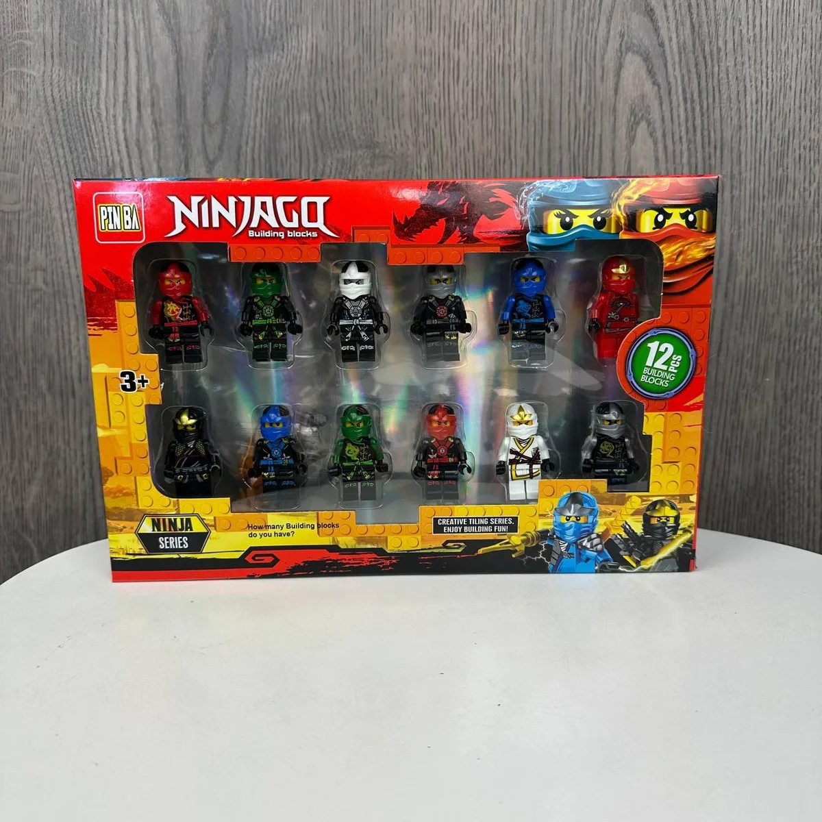 Набір фігурок LEGO Ніндзяго 12 шт пластик 26х17,5 см різні кольори