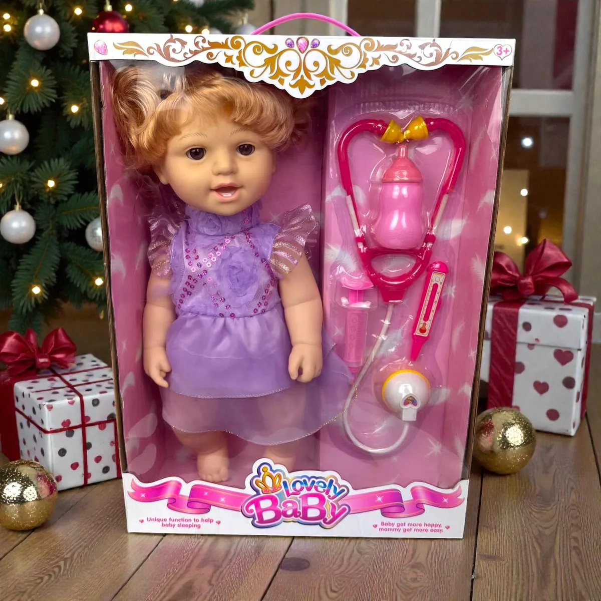 Дитяча динамічна лялька Lovely Baby інерційна з пляшкою пластикова 44х32х13 см рожевий