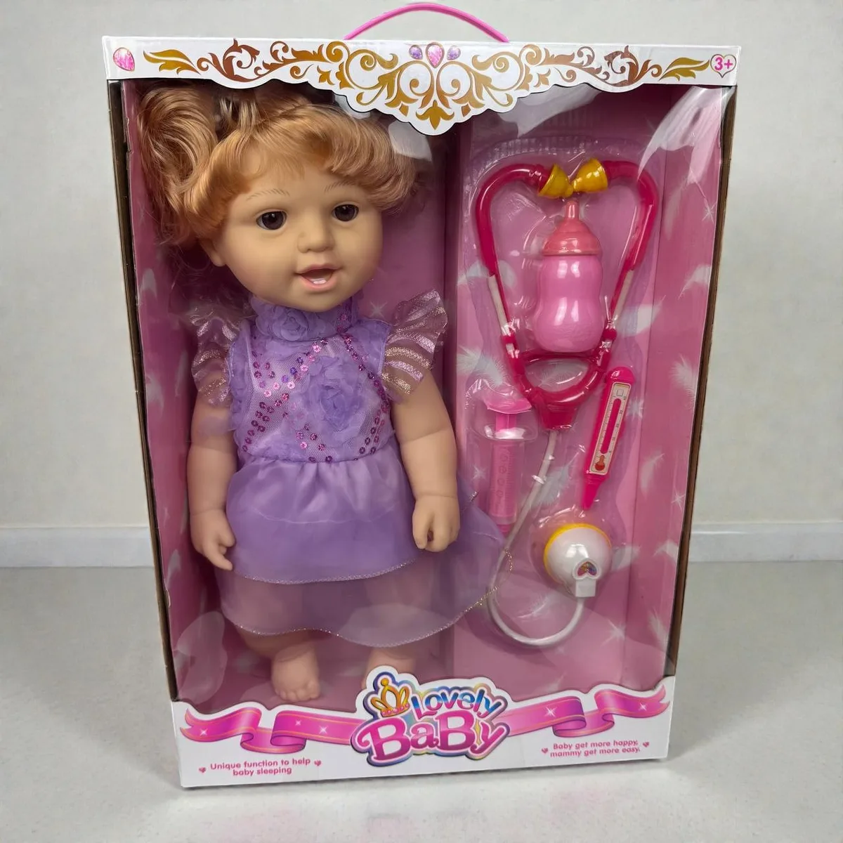 Дитяча динамічна лялька Lovely Baby інерційна з пляшкою пластикова 44х32х13 см рожевий