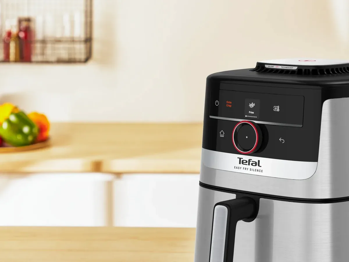 Мультипіч Tefal Easy Fry Silence Smart, 1670 Вт, об'єм 5 л, сенсорне управління, 55 програм, пластиковий корпус, сірий колір.
