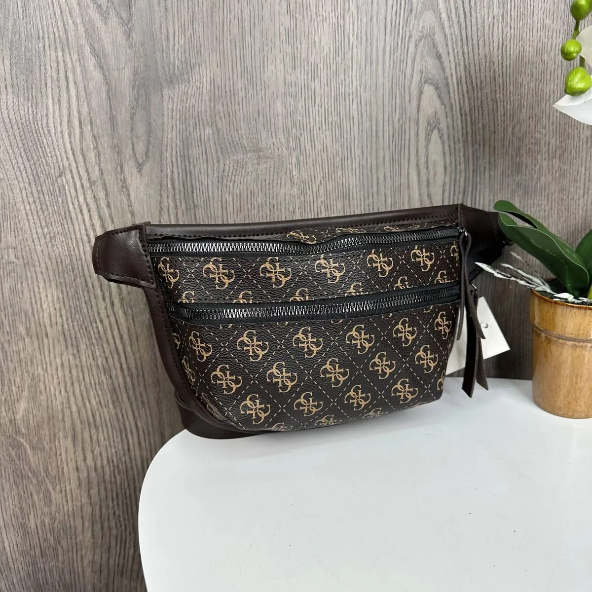 Женская бананка 24x16x4 см экокожа коричневая геометрический узор