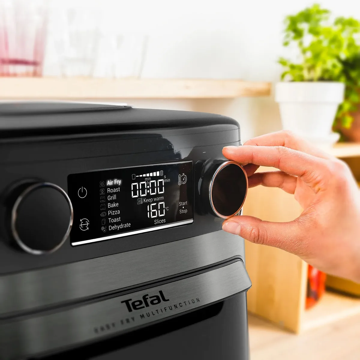 Мультипіч Tefal Easy Fry Multifunctional, 1800Вт, механічне керув., 9 програм, пластик, чорний