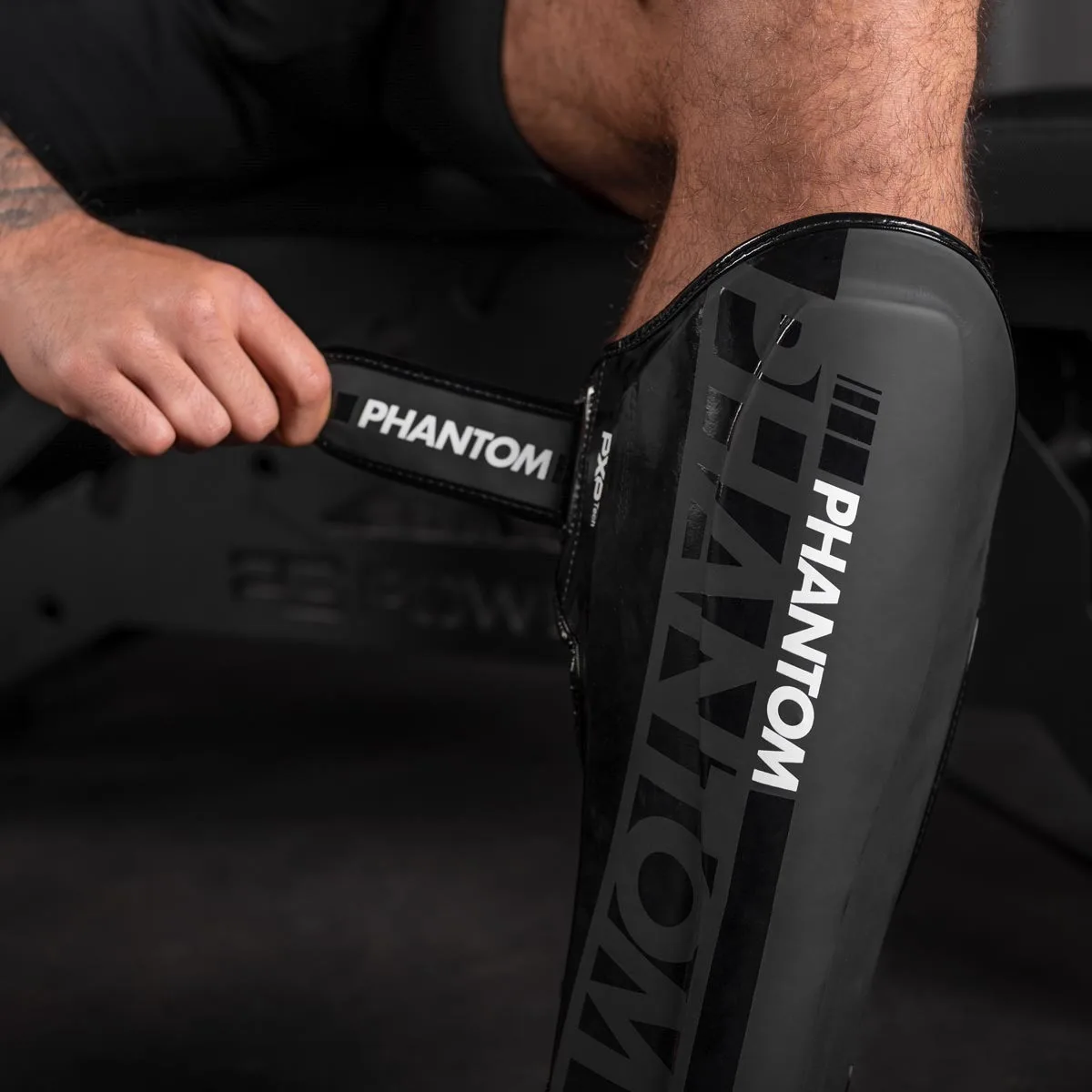 Захист гомілки стопи Phantom штучна шкіра L/XL чорний