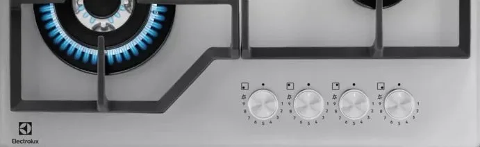Газова варильна поверхня Electrolux на скляній основі, 60 см, з чавунними решітками, сріблястого кольору.