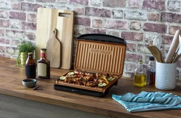 Гриль George Foreman притискний Copper Fit Grill, 1630 Вт, 1 температурний режим, пластиковий корпус, чорний.