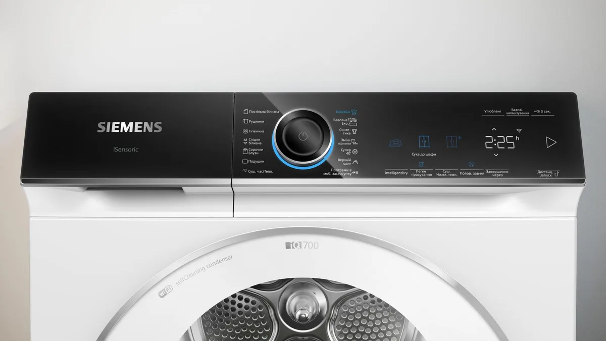 Сушильна машина Siemens конденсаційна 9 кг біла 60 см з дисплеєм