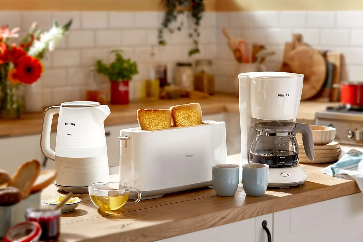 Тостер Philips пластик 1 отделение белый 870Вт