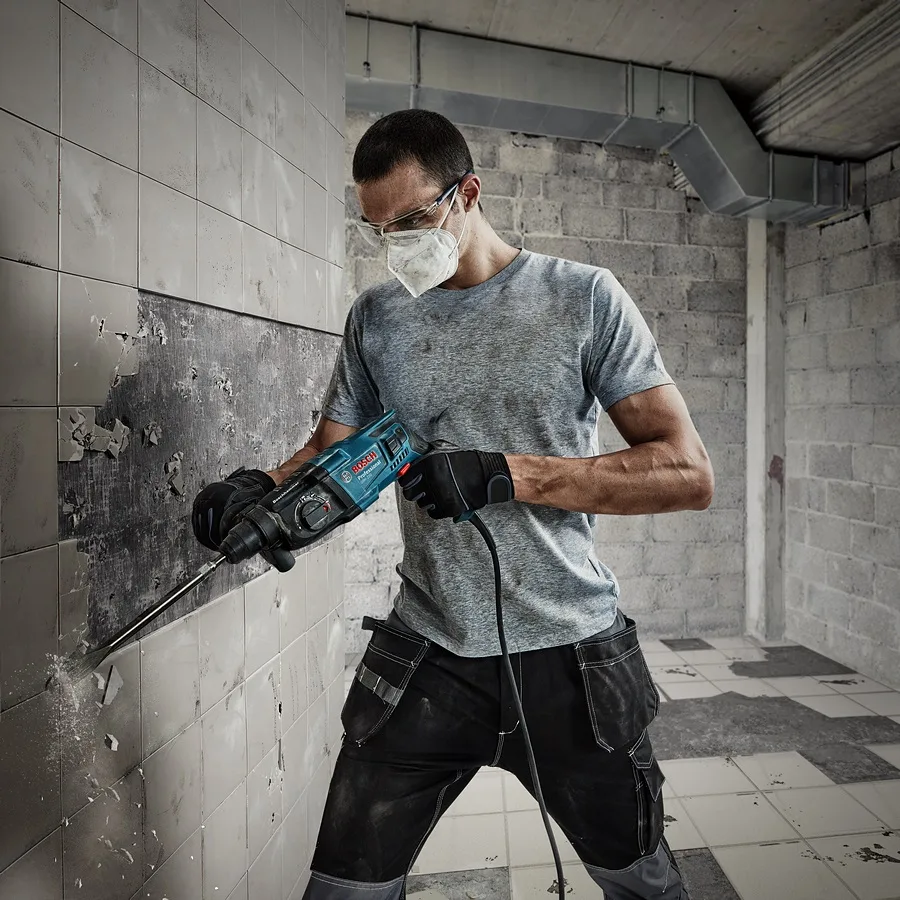 Перфоратор Bosch Professional 720Вт з ударом 2Дж для свердління в бетоні довбанням та реверсом