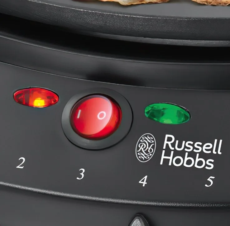 Електрична млинниця Russell Hobbs Fiesta 1000Вт, діаметр 30 см, з тефлоновим покриттям, чорного кольору.